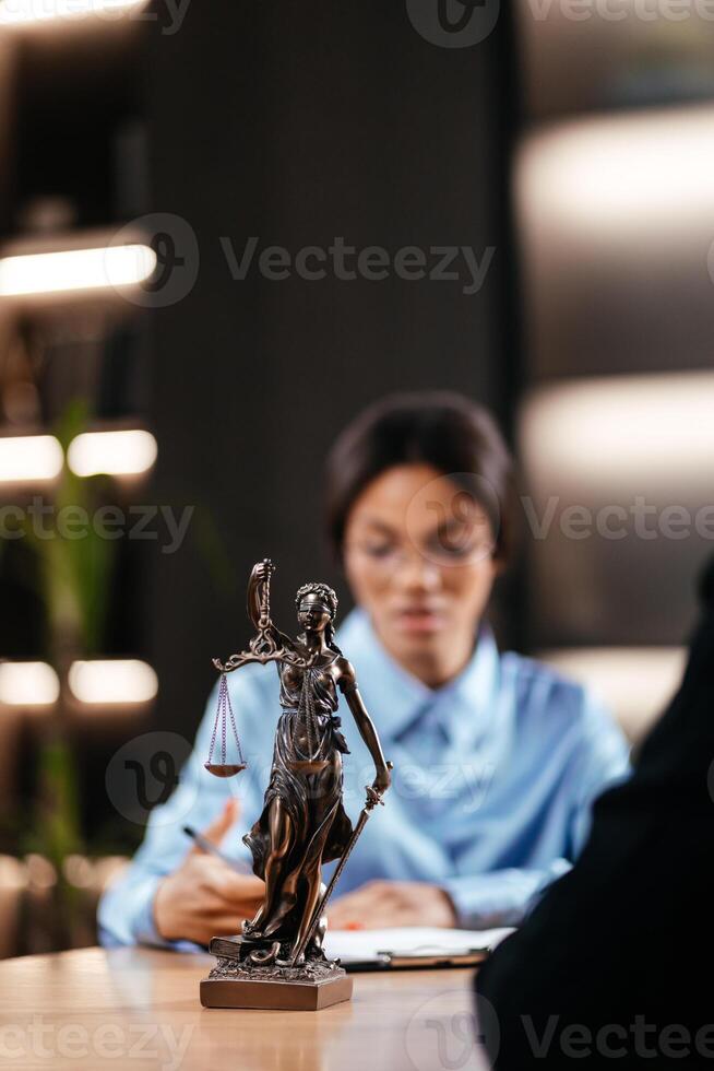 African america Public Defender Writes Down Arguments for Defence Strategy. Successful Attorney Lawyer Fight for Freedom of Her Client with Supporting Evidence.n photo