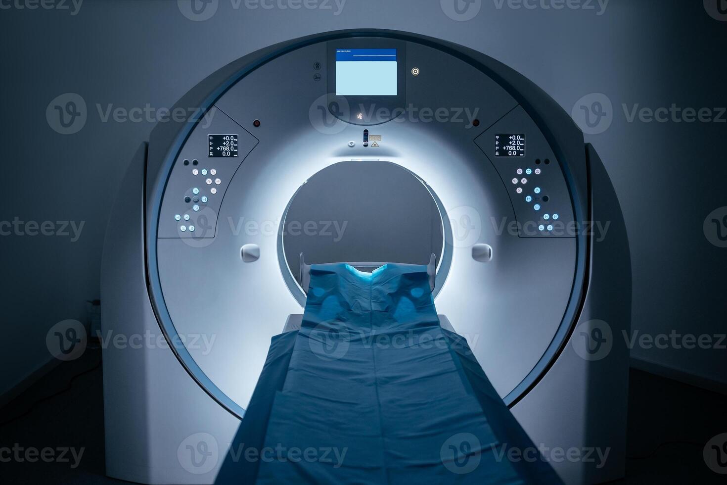 Medical CT, MRI machine located in diagnostic clinic, showcasing advanced imaging technology. Equipment is vital for accurate diagnoses and ensures high-quality patient care. Banner, blue background photo