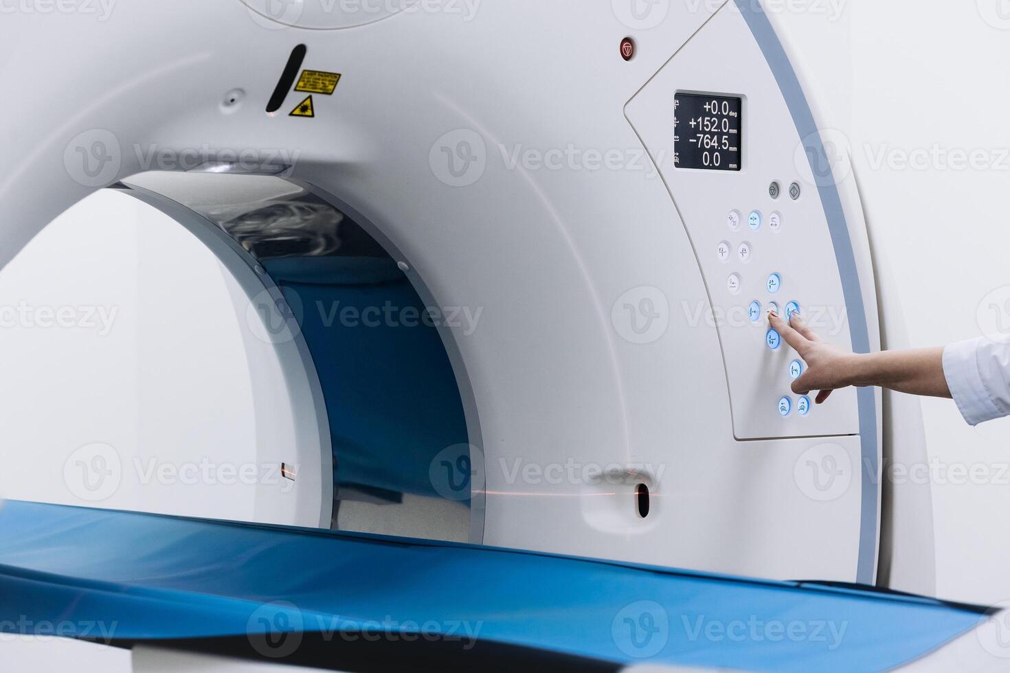 MRI machine is positioned in a hospital, showcasing advanced imaging technology. This essential equipment is crucial for detailed diagnostics, reflecting the hospital commitment to quality patient photo