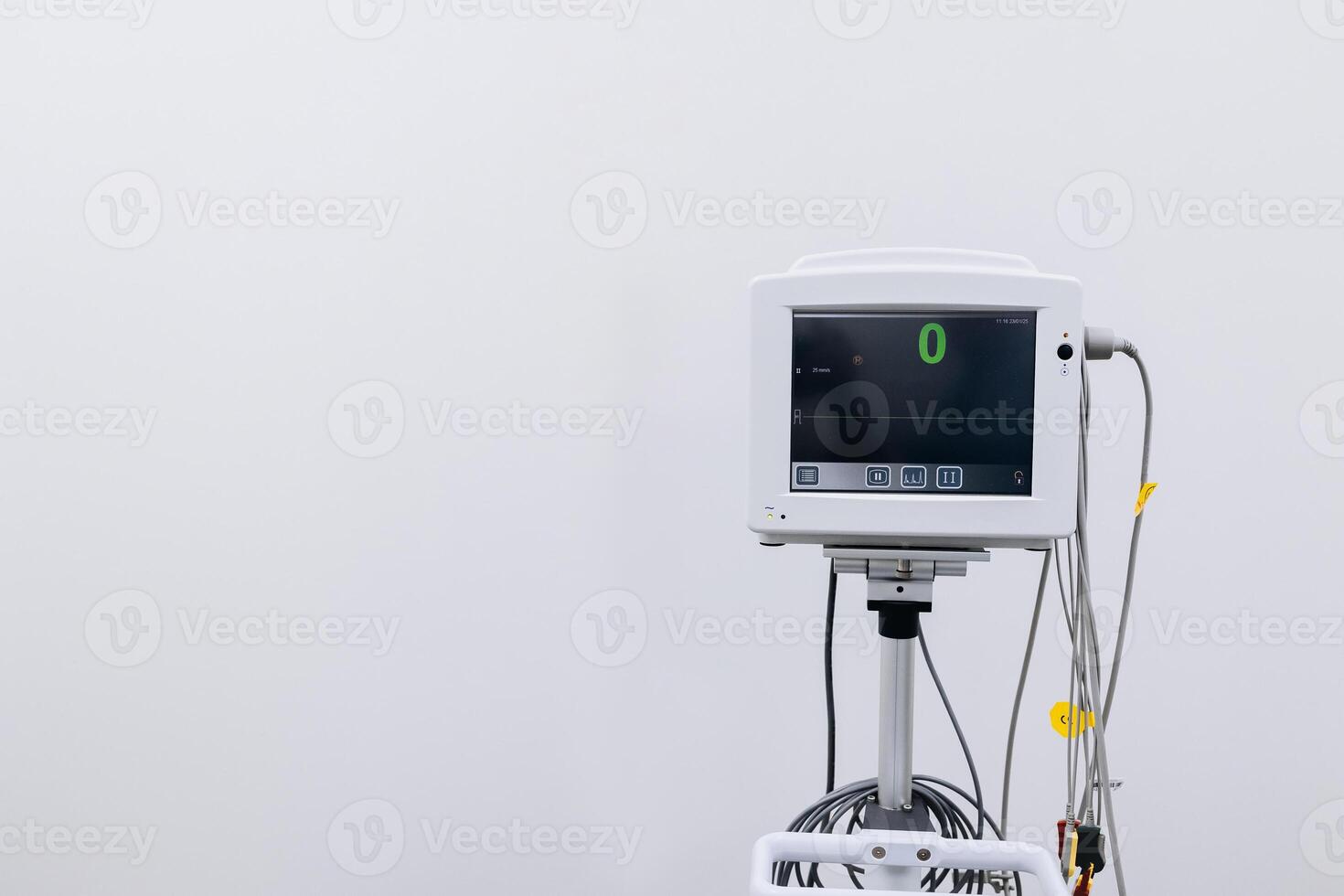 Close-up Heart rate monitor in clinic. White background. Symbolize patient's health status and medical care vigilance. Banner, copy space, advertising. photo
