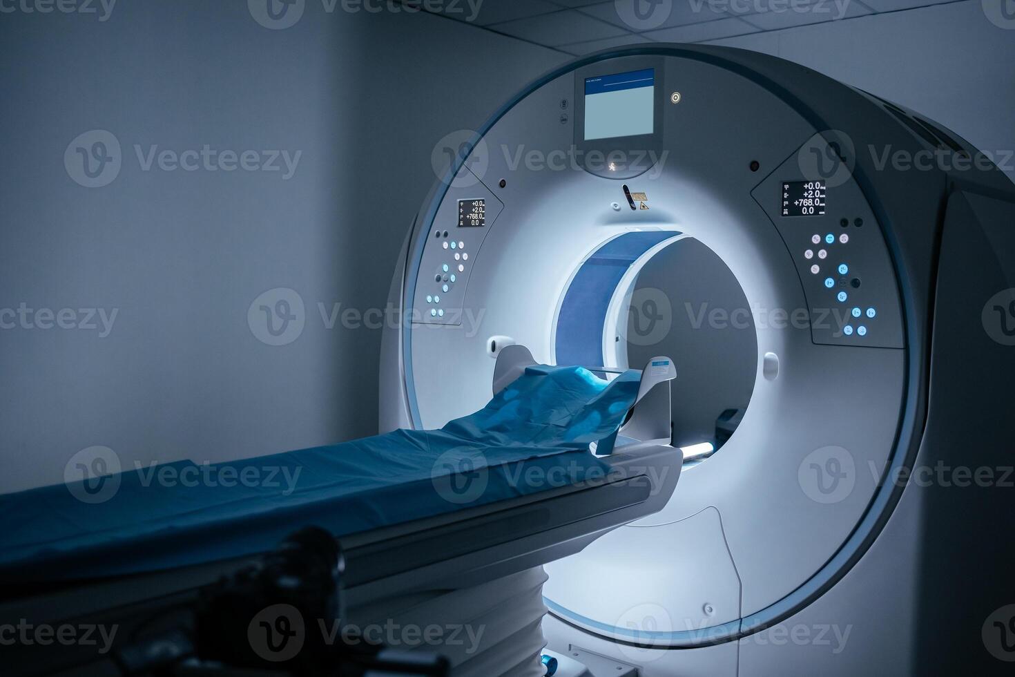 Modern hospital and communication network concept. Medical technology. Magnetic resonance imaging scan device in Hospital. Blue background, art lighting, blue filter. MRI scanner capsule. Copy space photo
