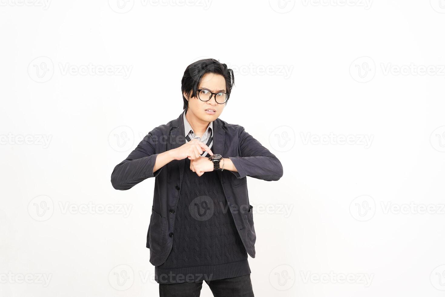 A man in glasses and a sweater is making a gesture photo