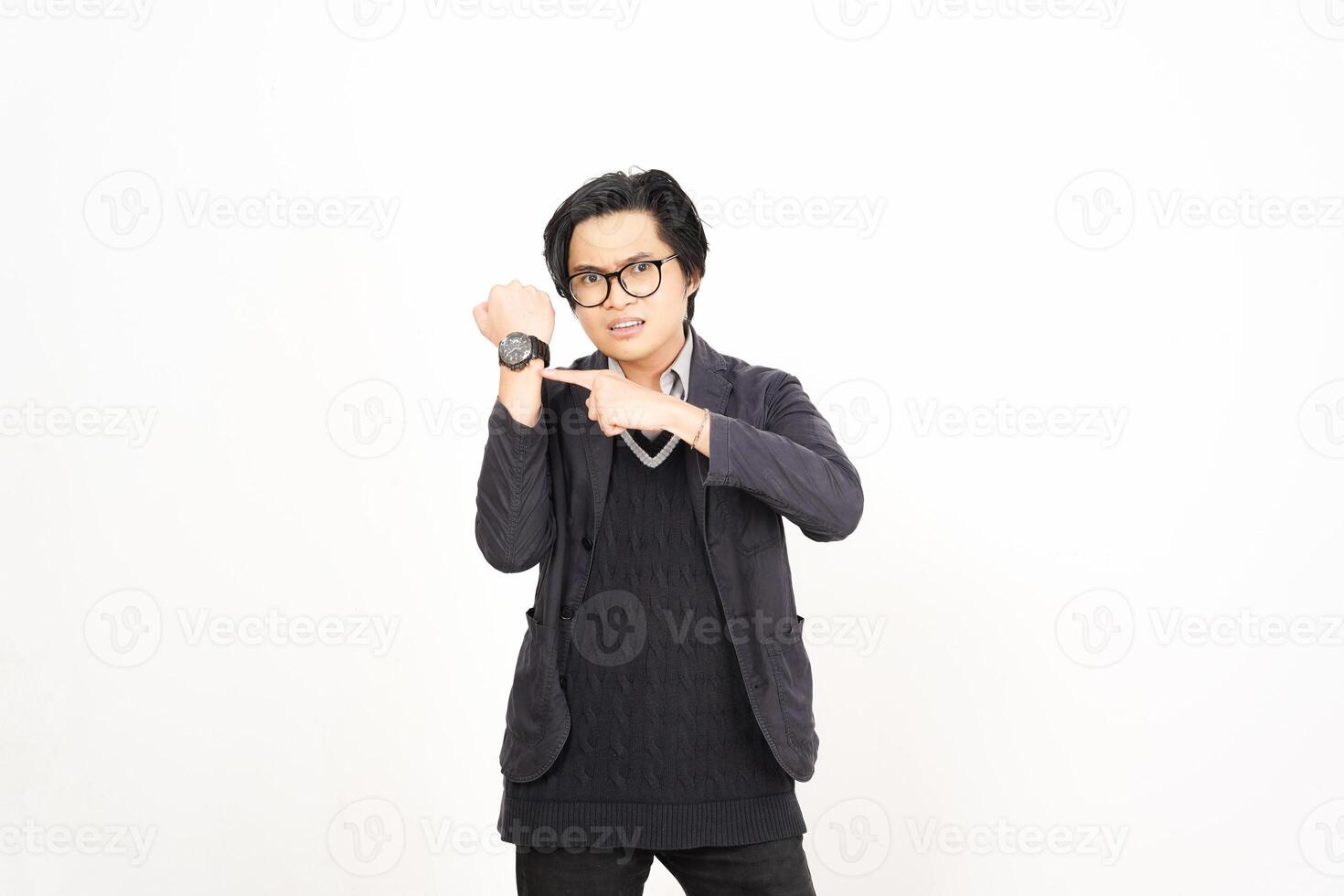 A man in glasses and a sweater is making a gesture photo