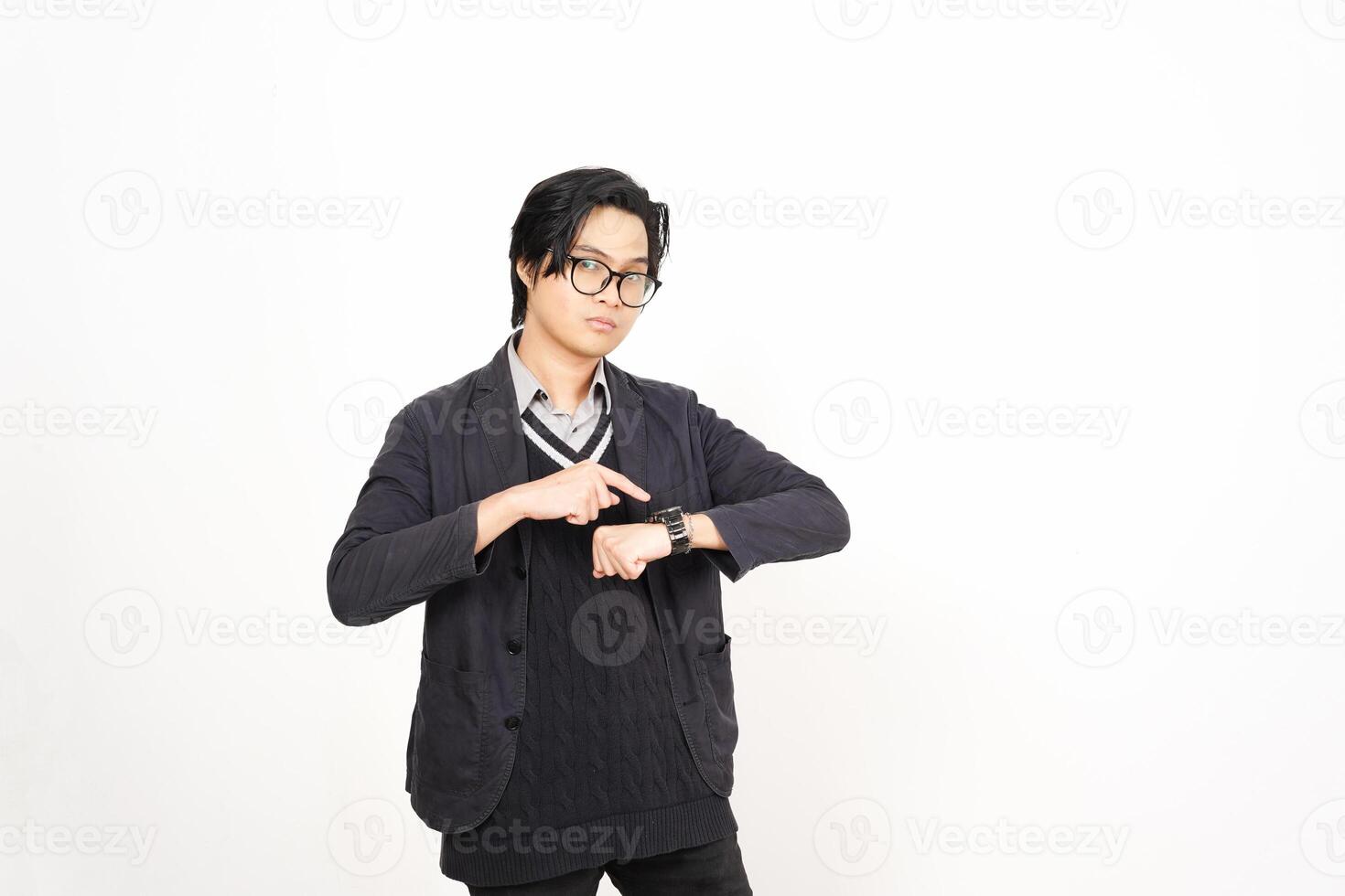 A man in glasses and a sweater is making a gesture photo
