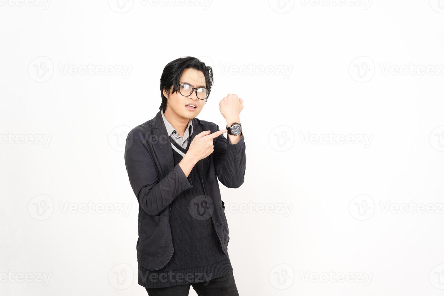 A man in glasses and a sweater is making a gesture photo
