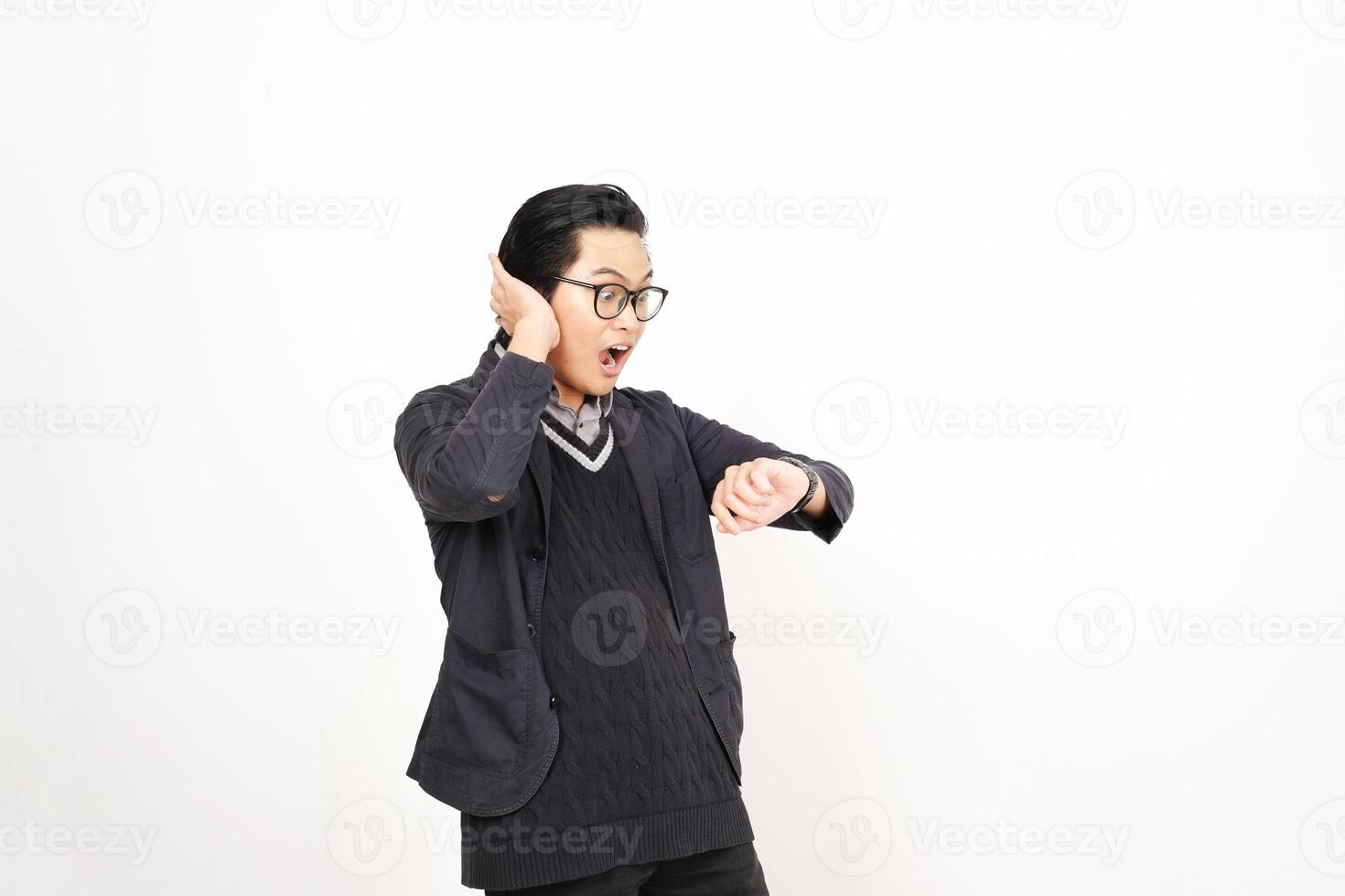 A man in glasses and a sweater is making a gesture photo