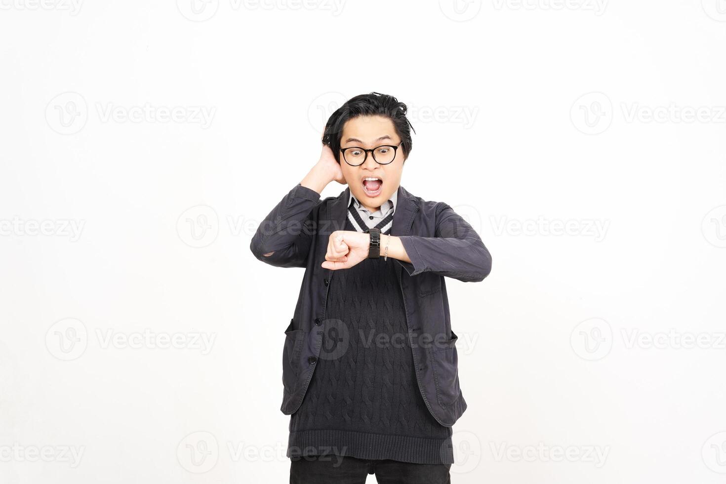 A man in glasses and a sweater is making a face photo