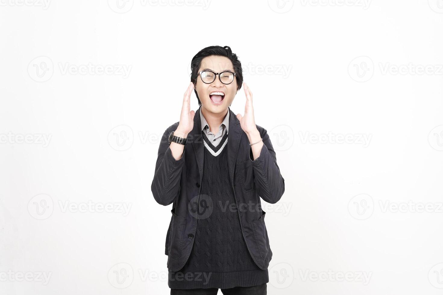 A man in glasses and a sweater is making a face photo