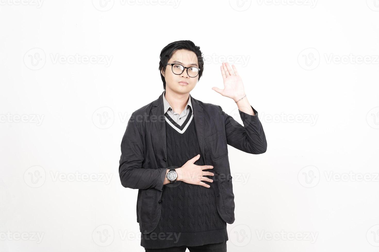 A man in glasses and a sweater is making a gesture photo