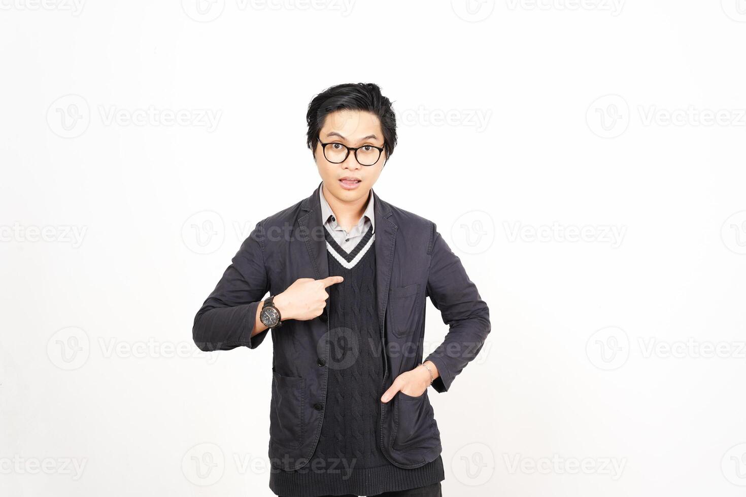 A man in glasses and a sweater pointing his finger photo