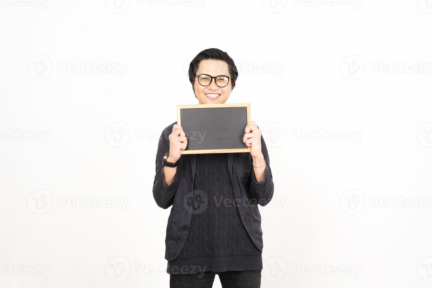 A man holding a blackboard with his hands photo