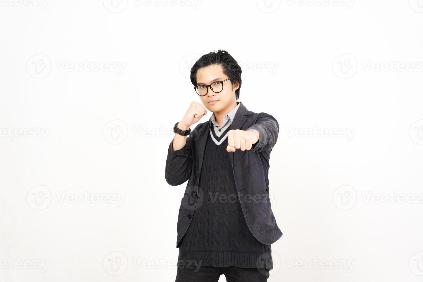 A man in glasses and a jacket pointing at something photo