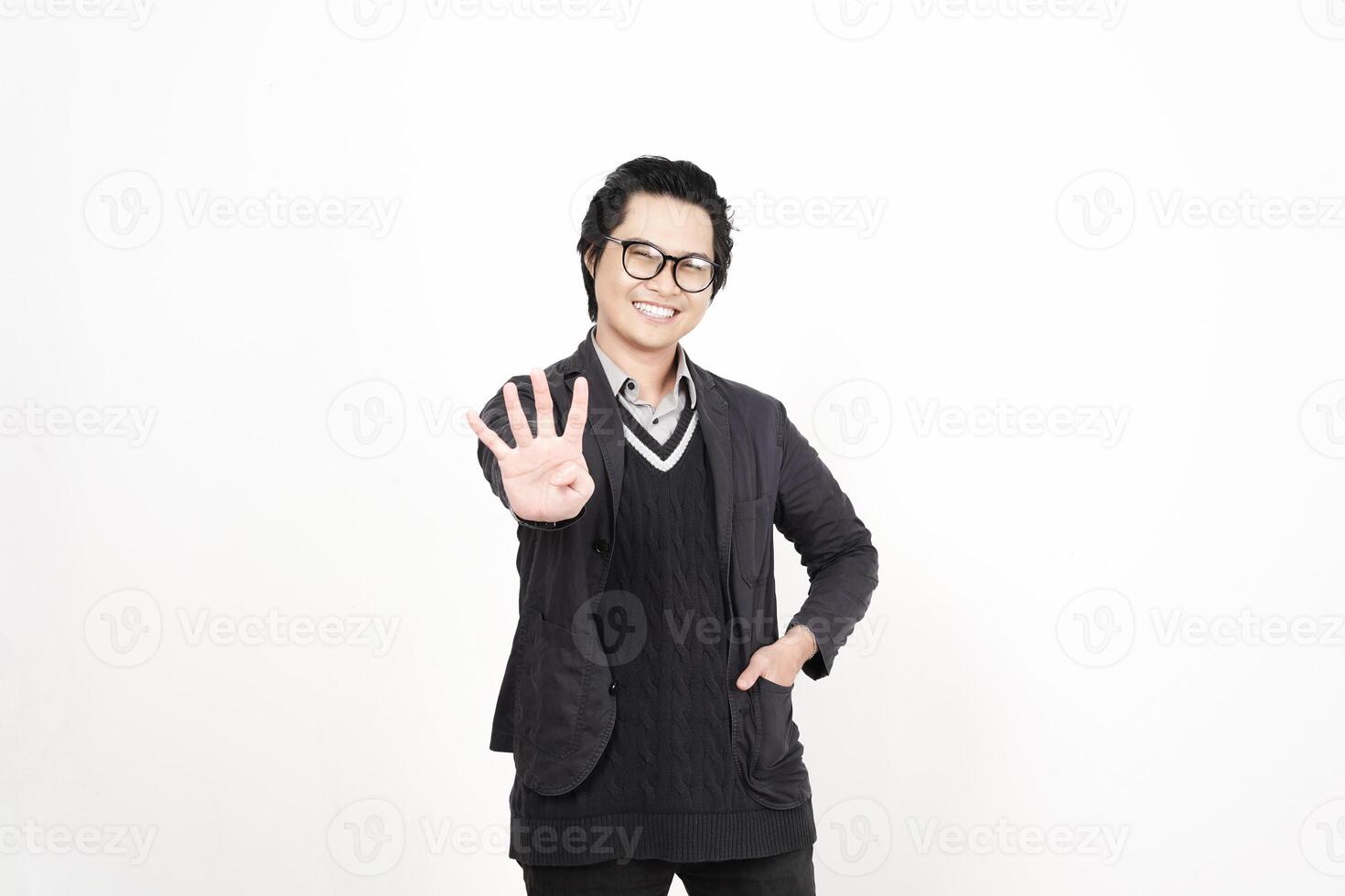 A man in glasses and a sweater is waving photo