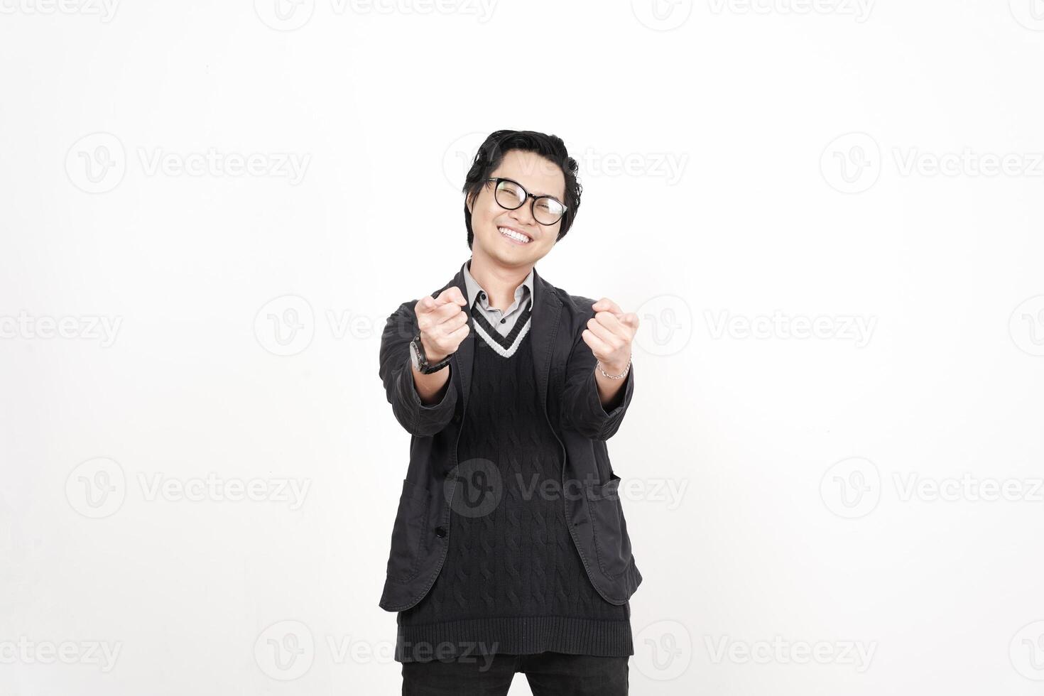 A man in glasses and a sweater is making a gesture photo
