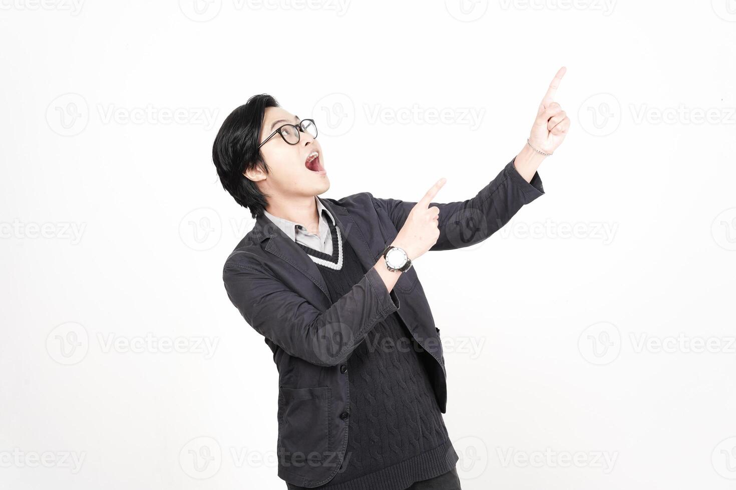 A man in glasses pointing up with his hand photo
