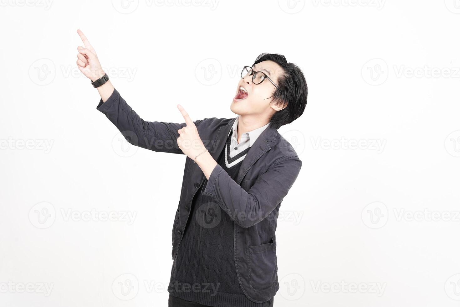 A man in glasses pointing up in the air photo