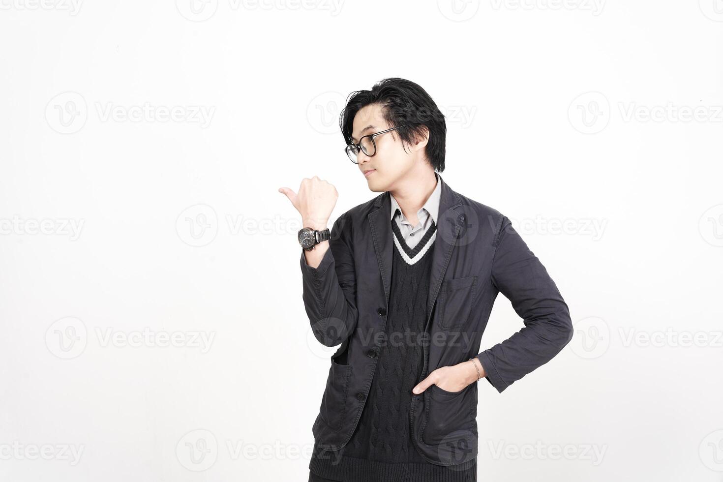 A man in glasses and a sweater is making a gesture photo