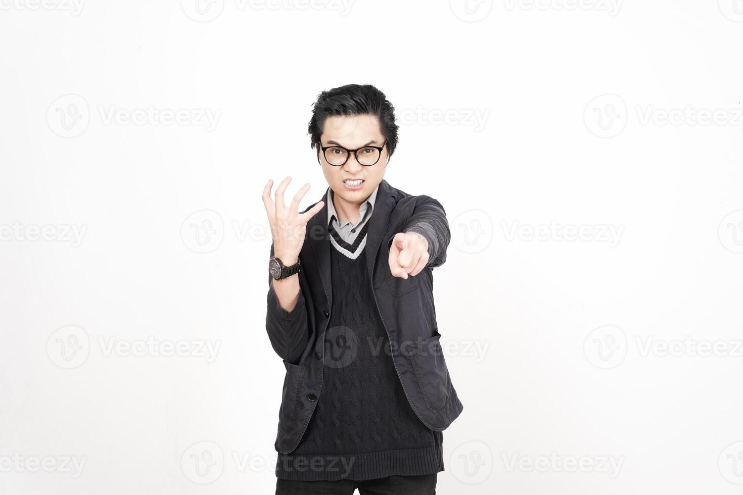 A man in glasses pointing at something photo