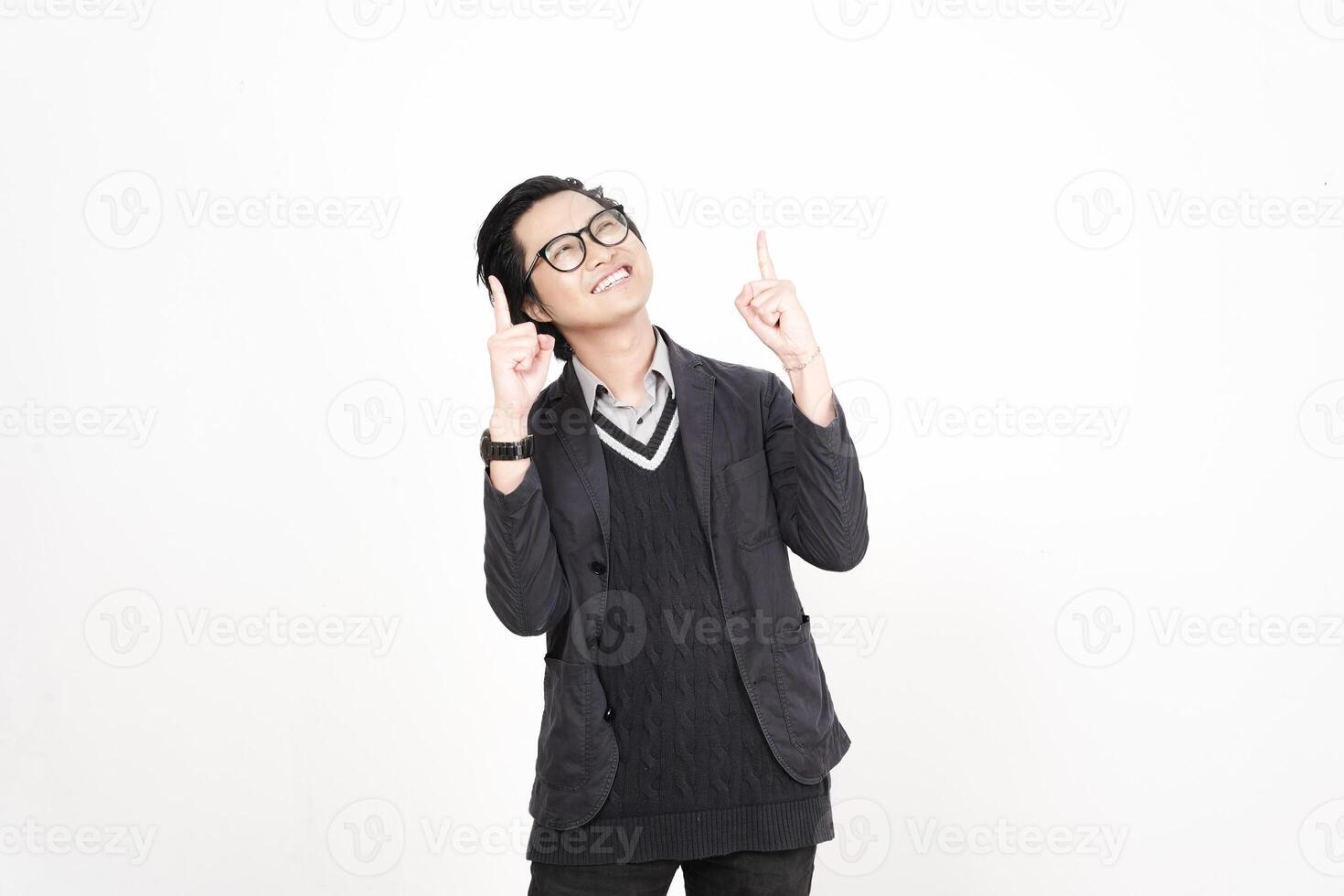A man in glasses and a sweater is pointing up photo