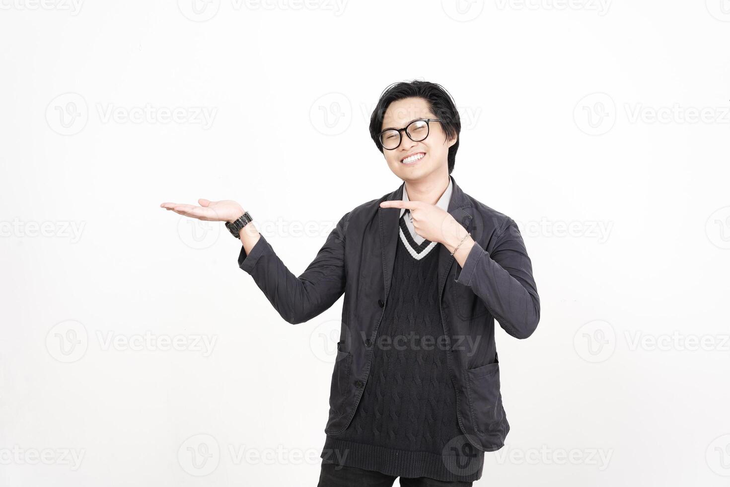 Asian man in glasses pointing at something photo