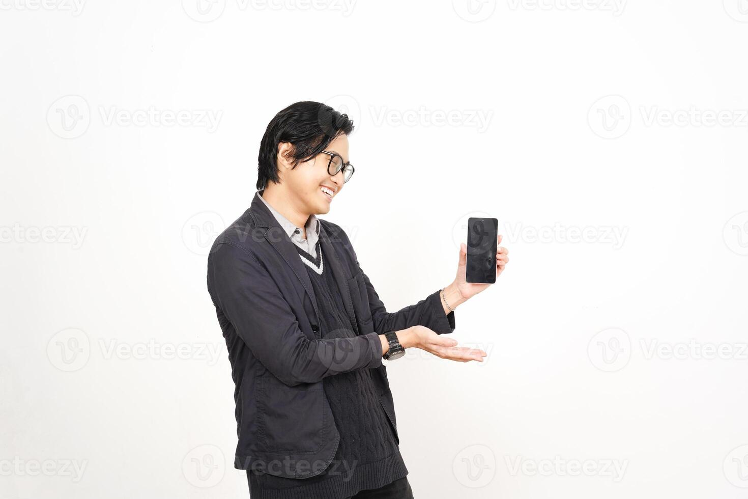 A man in glasses holding a cell phone photo