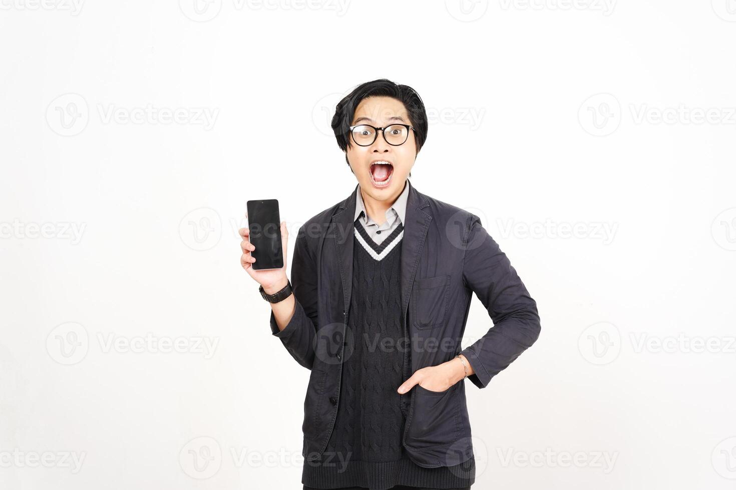 A man in glasses holding a cell phone photo