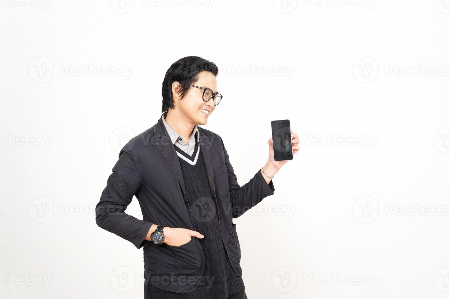 Asian man in suit holding a smart phone photo