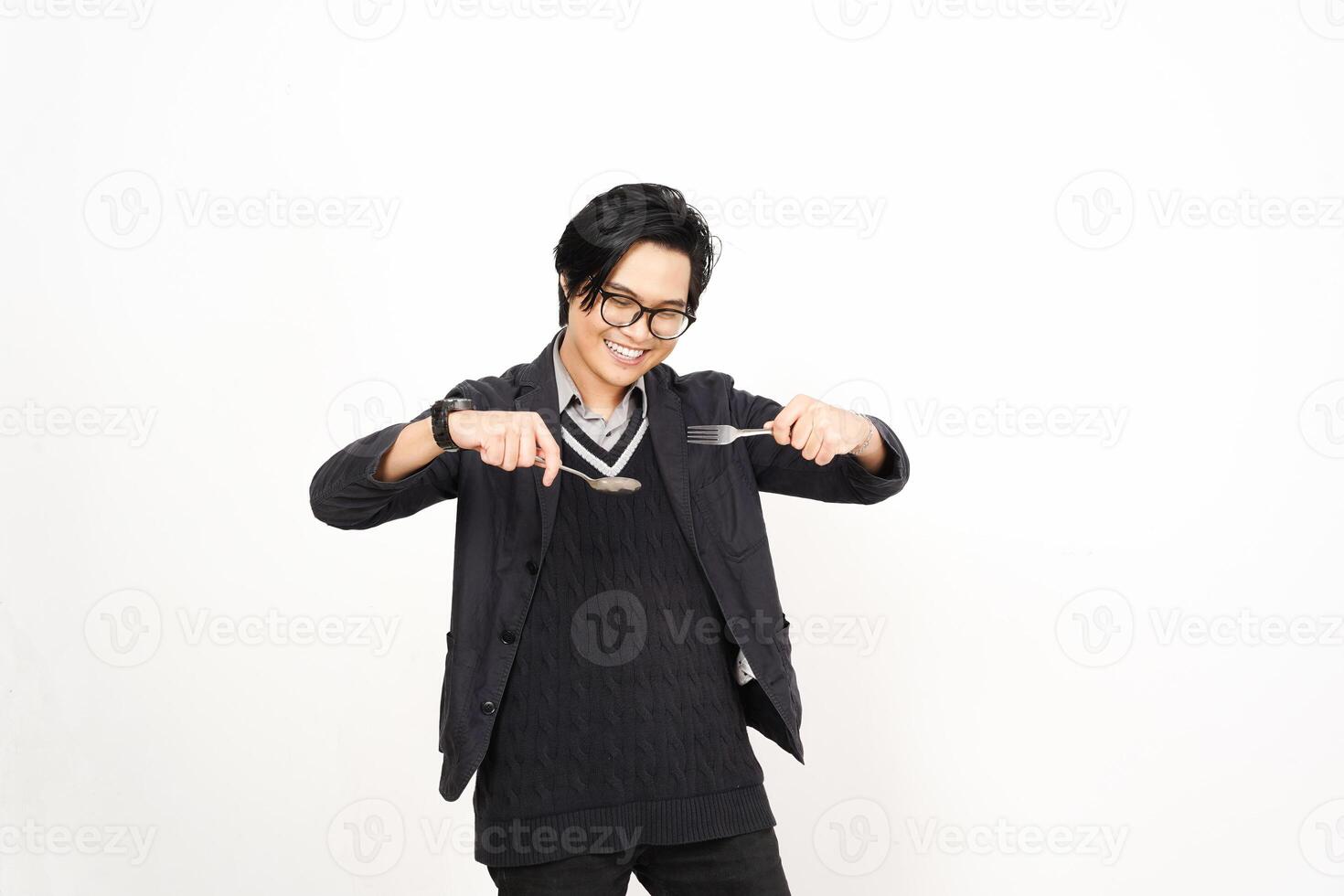 A man in glasses holding a knife and fork photo