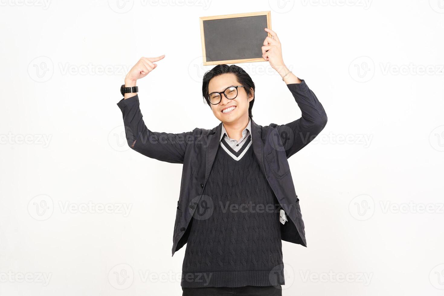 A man holding up a chalkboard with his hands photo