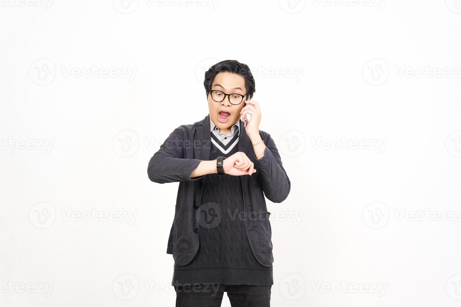 A man in glasses and a sweater is making a face photo