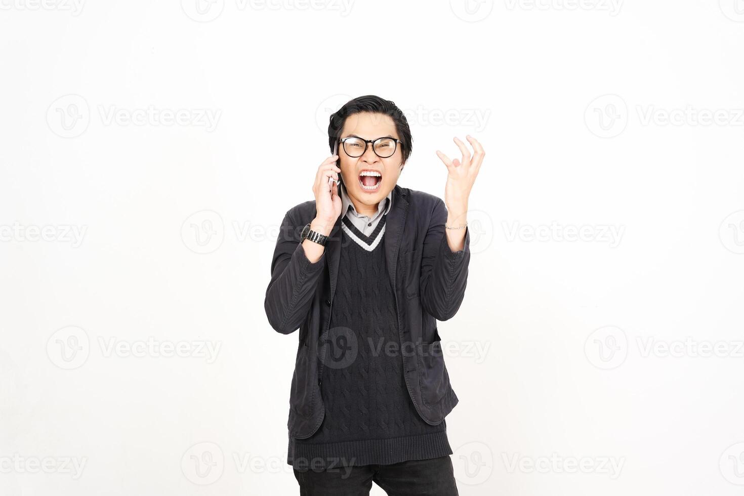 A man in glasses and a sweater is making a face photo