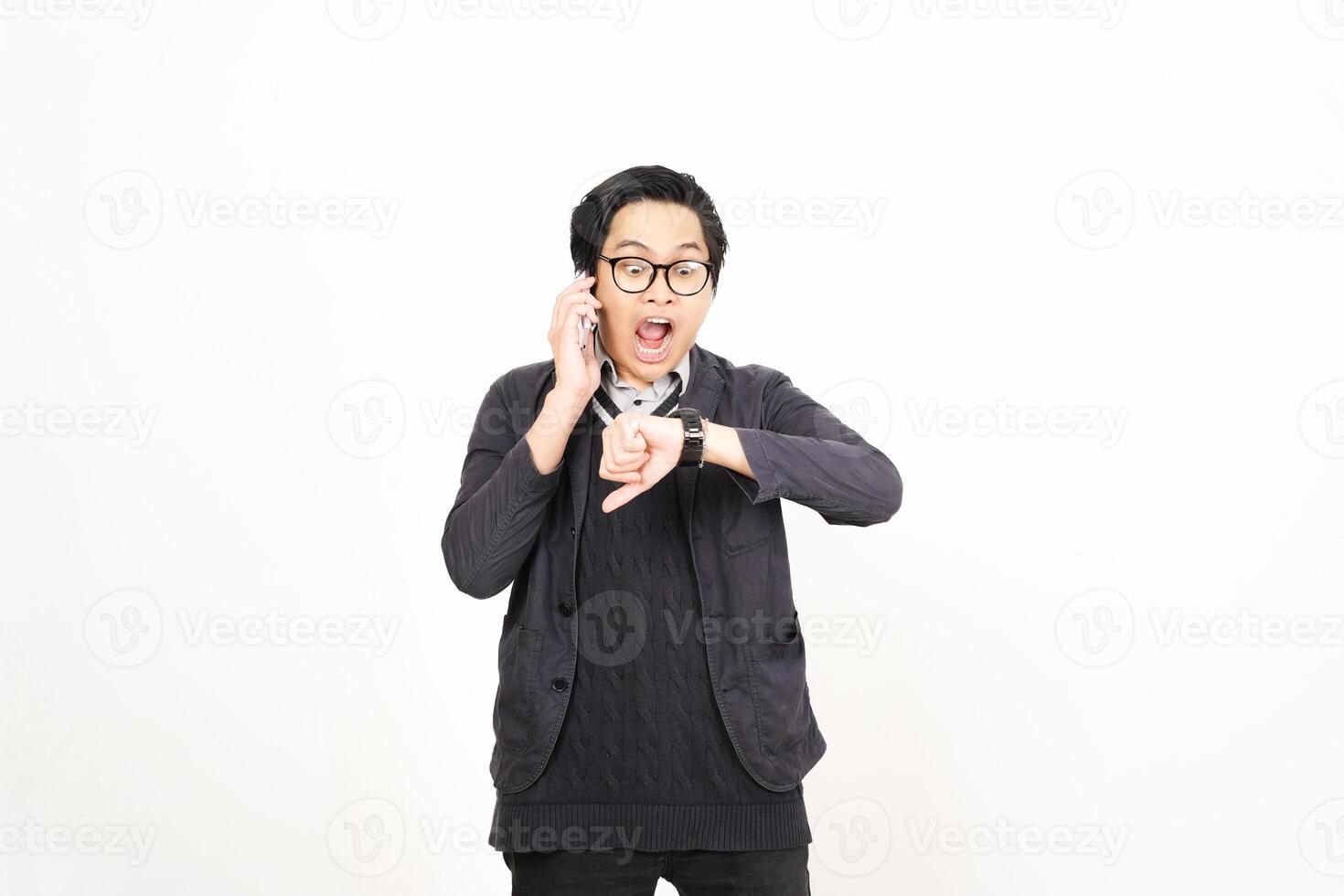 A man in glasses and sweater is making a gesture with his hand photo
