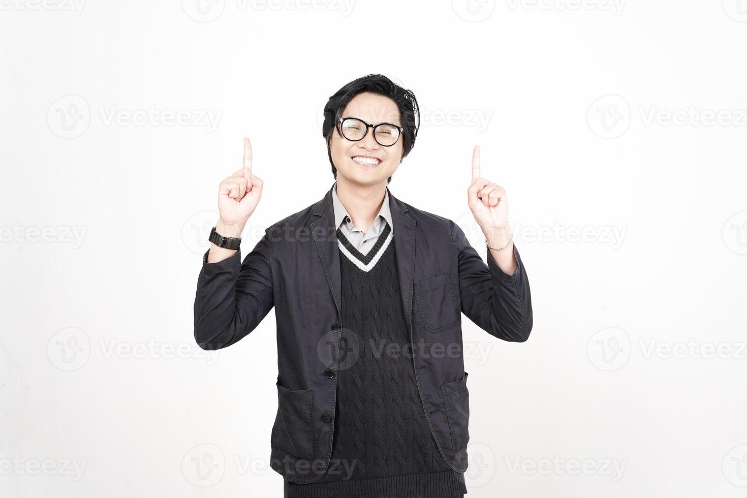 A man in glasses and a sweater is pointing up photo