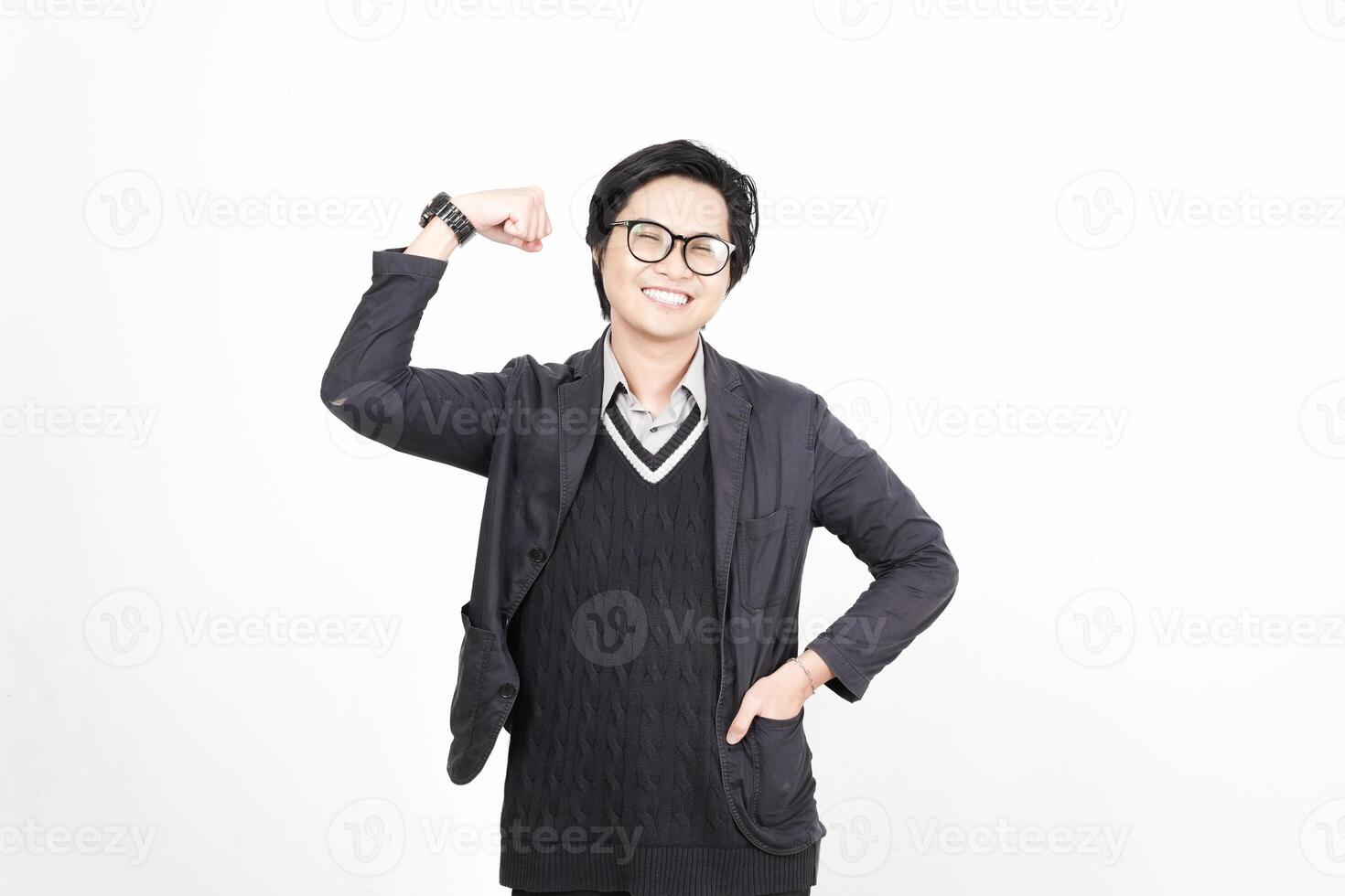 A man in glasses and a sweater posing for the camera photo