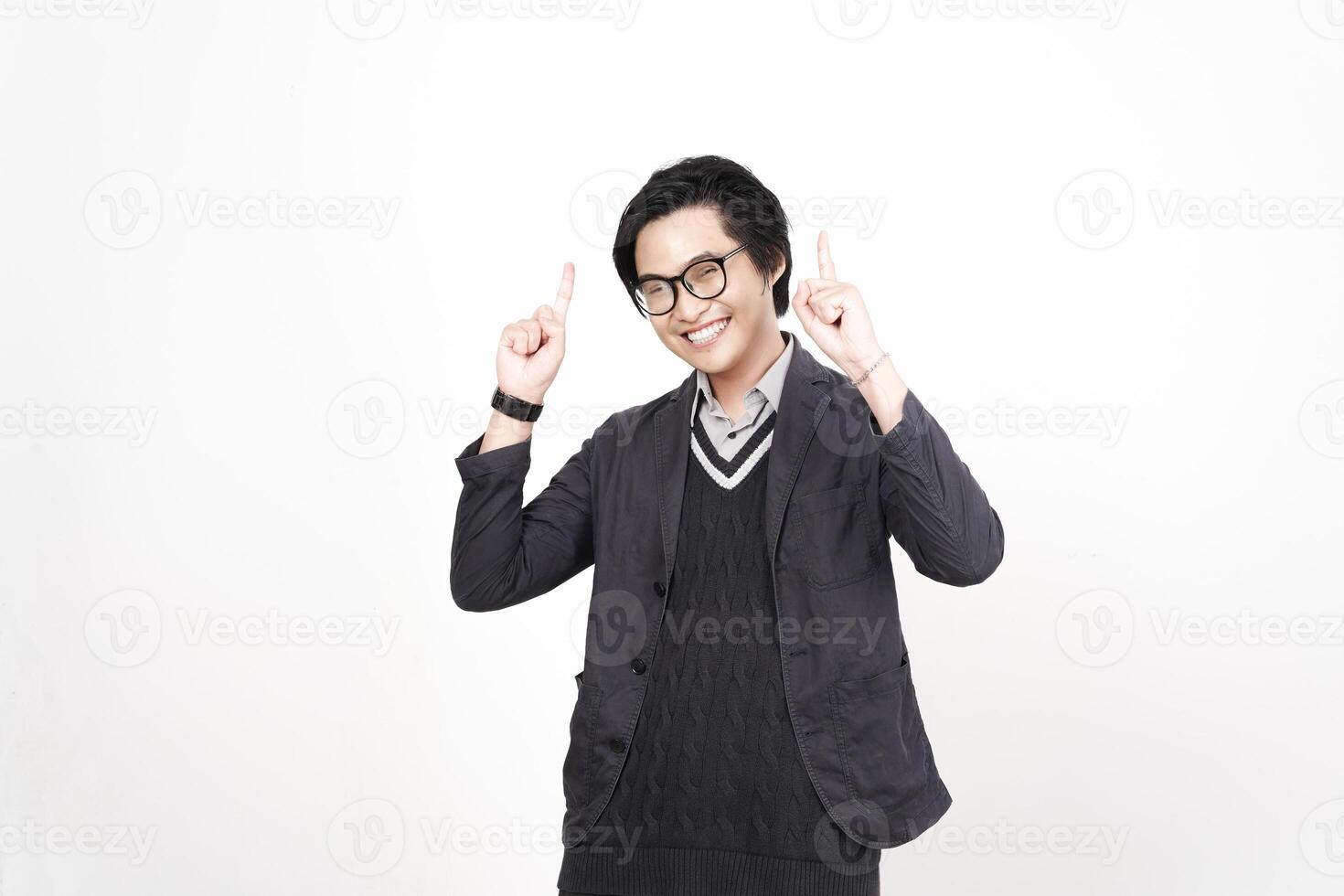 A man in glasses and a sweater is making a gesture photo