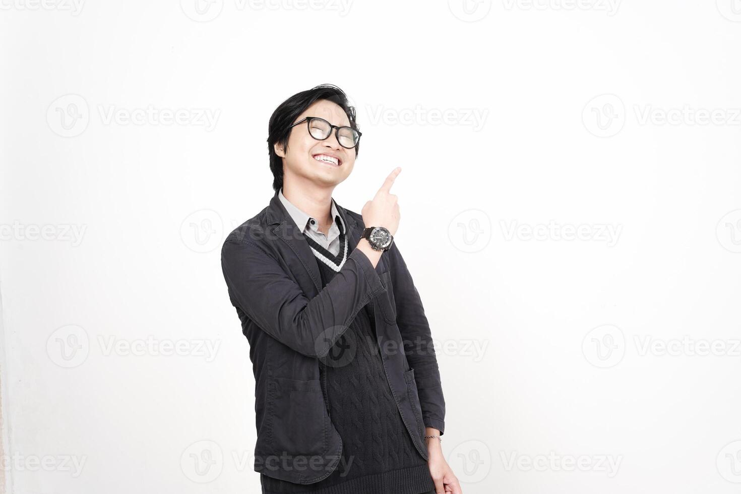 A man in glasses pointing at something photo