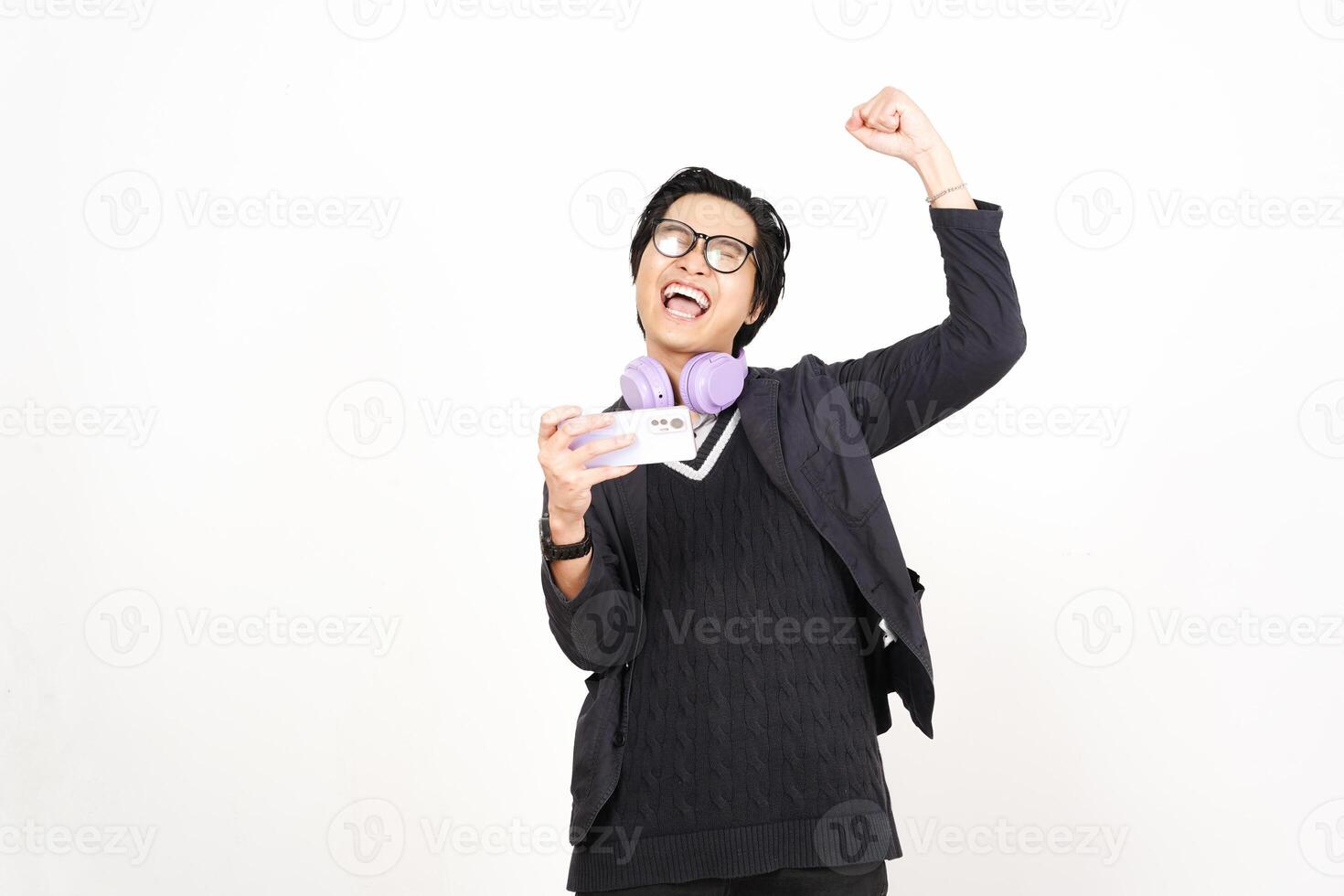A man with headphones and glasses holding a cup photo