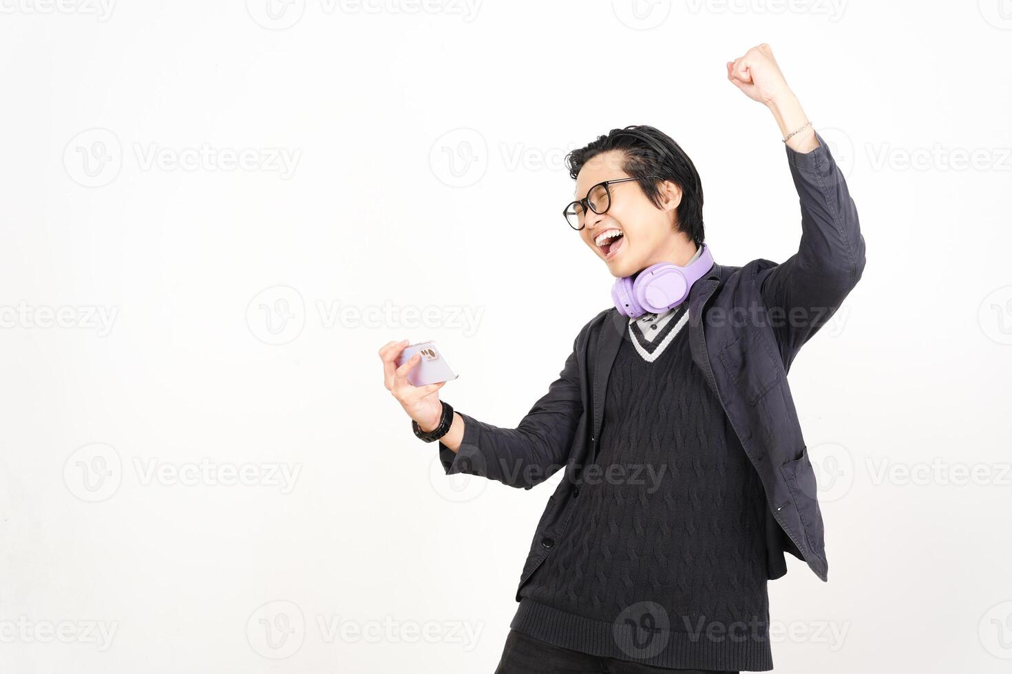 A man in glasses and a sweater is holding a phone photo