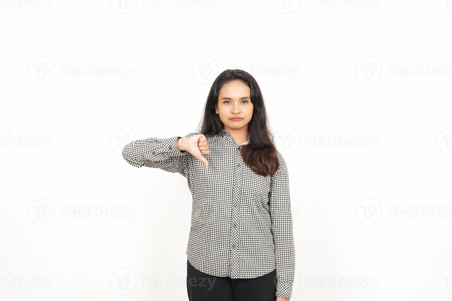 A woman is pointing her finger at something photo