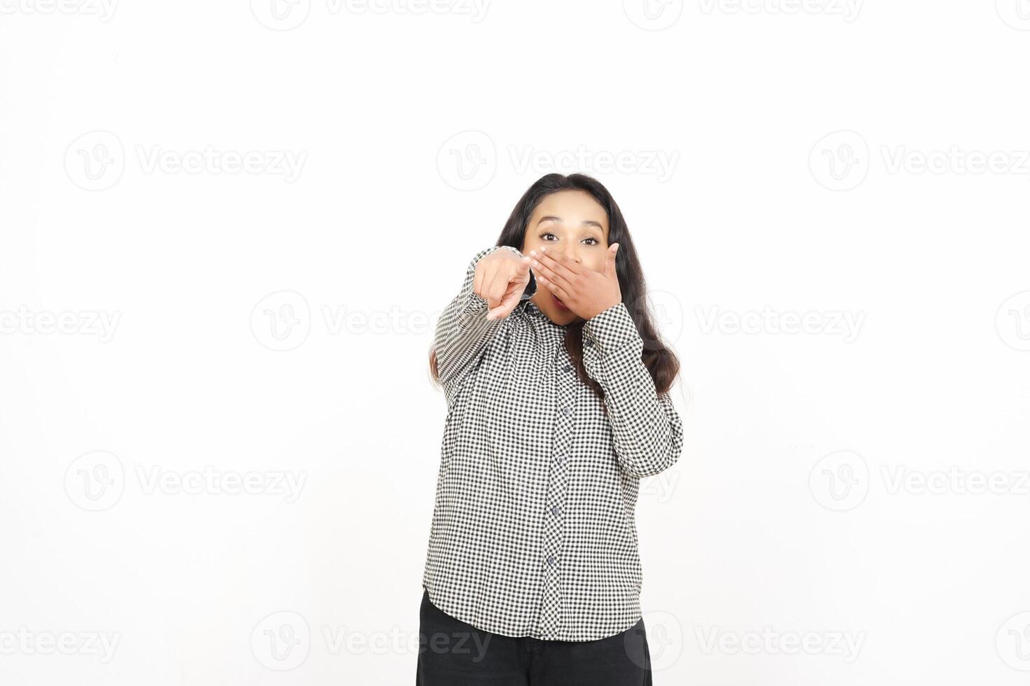 A woman is pointing her finger at something photo