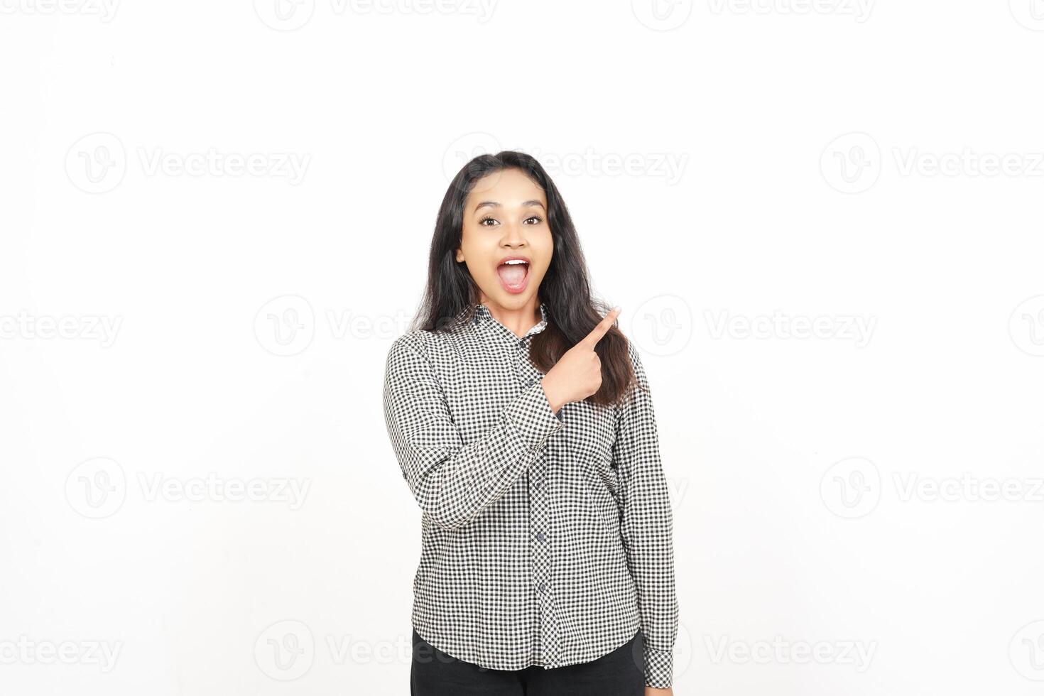 A woman is making a funny face while standing photo