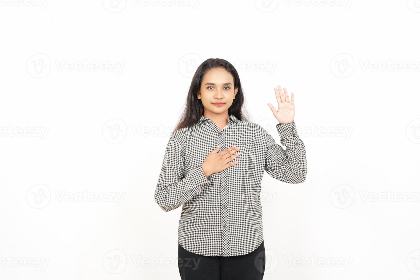 A woman is making a gesture with her hands photo