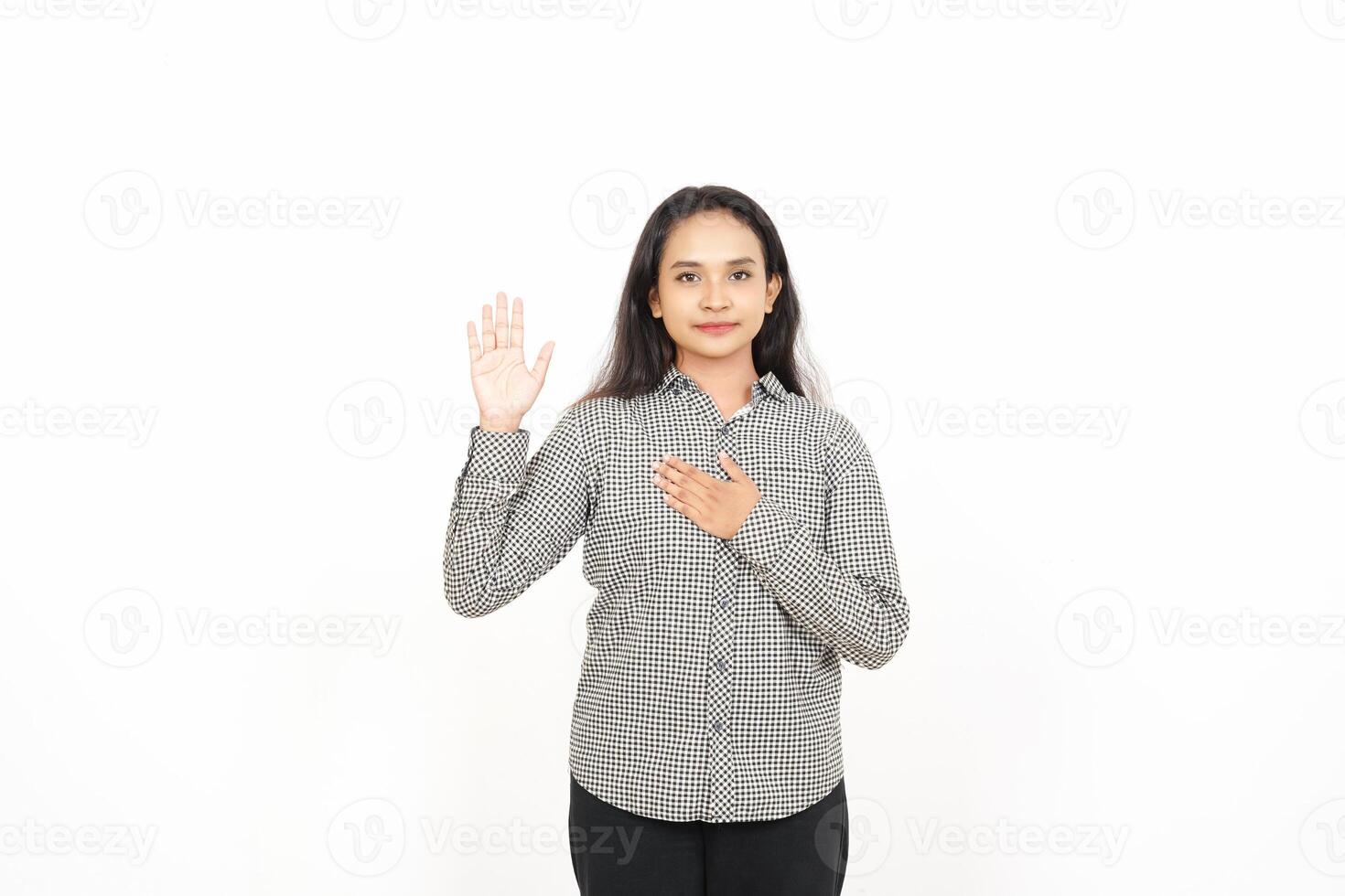 A woman is making a gesture with her hands photo