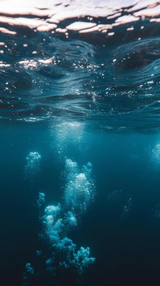 Underwater view of bubbles in the ocean photo