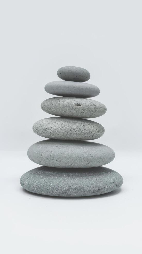 A stack of stones on a white background photo