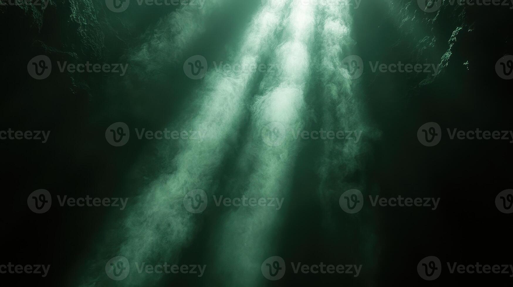 A light beam coming out of a cave photo