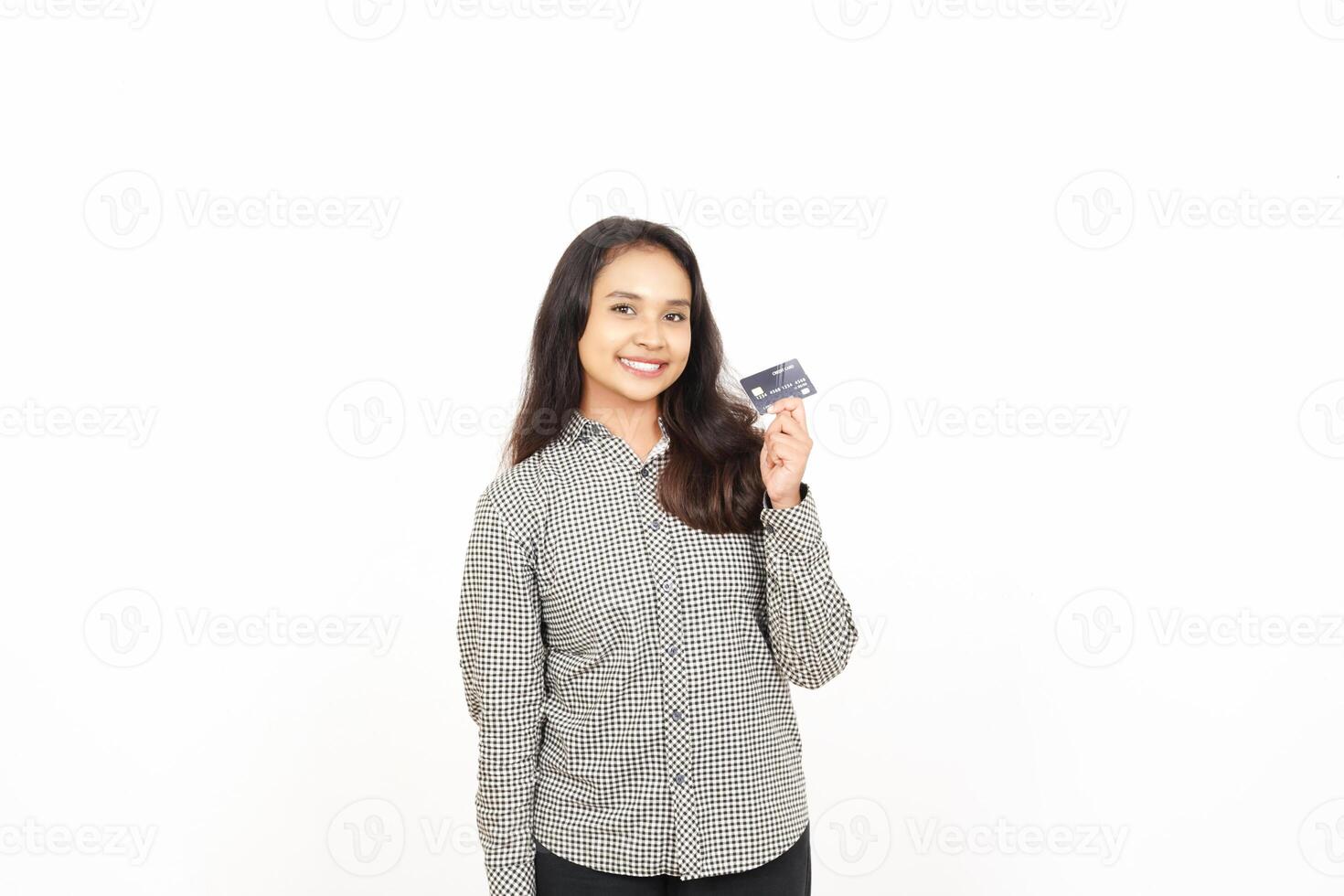 A woman holding a credit card in her hand photo