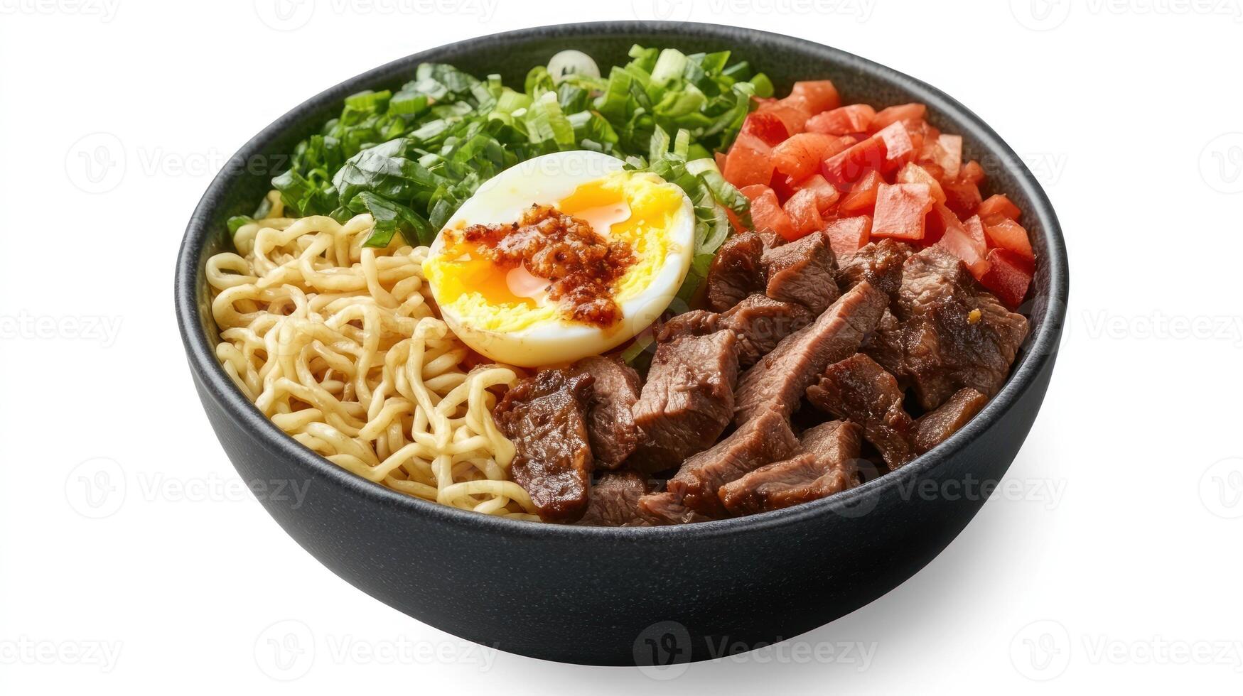 A bowl of noodles, meat, and an egg photo