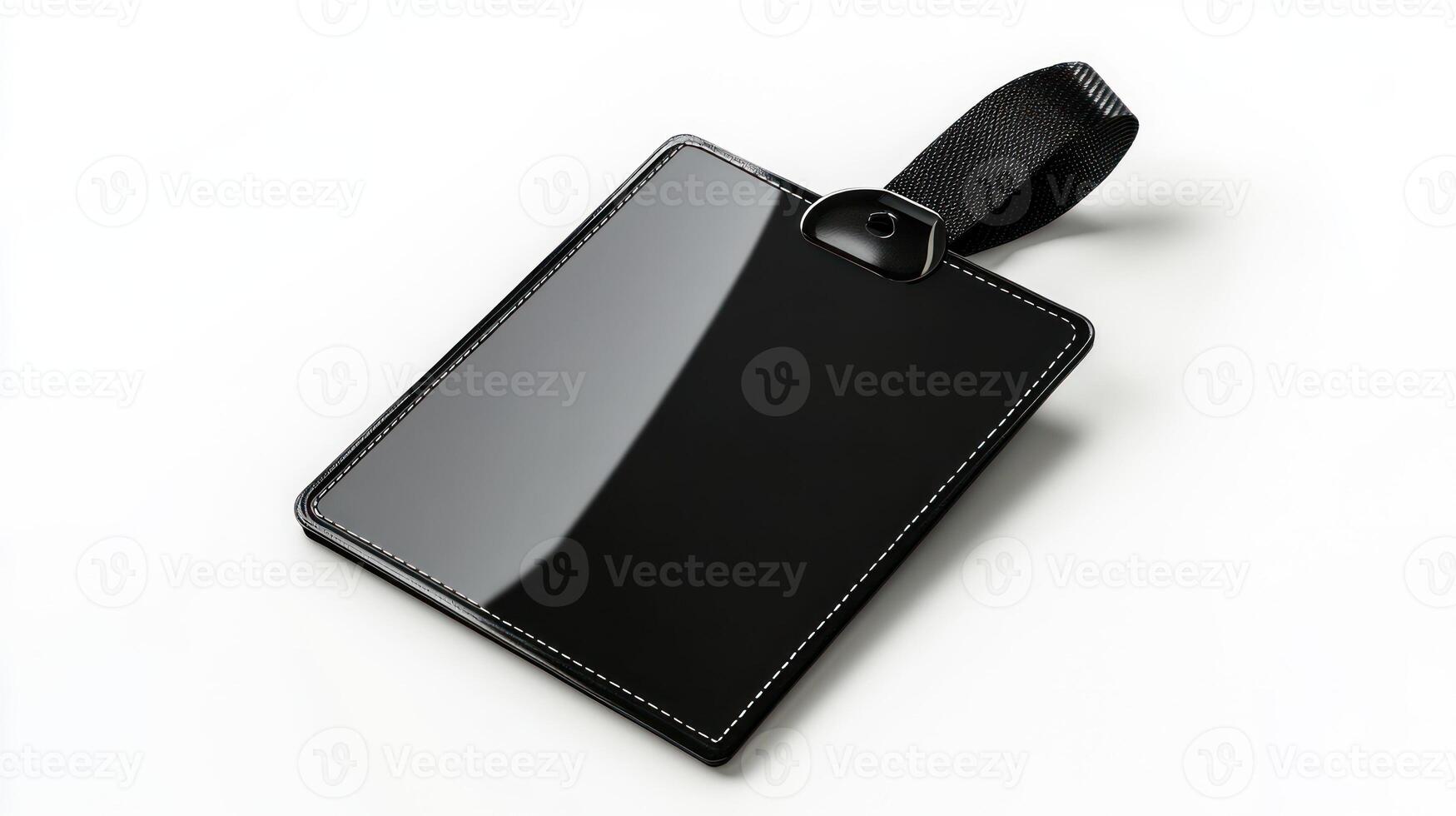 A black luggage tag on a white surface photo