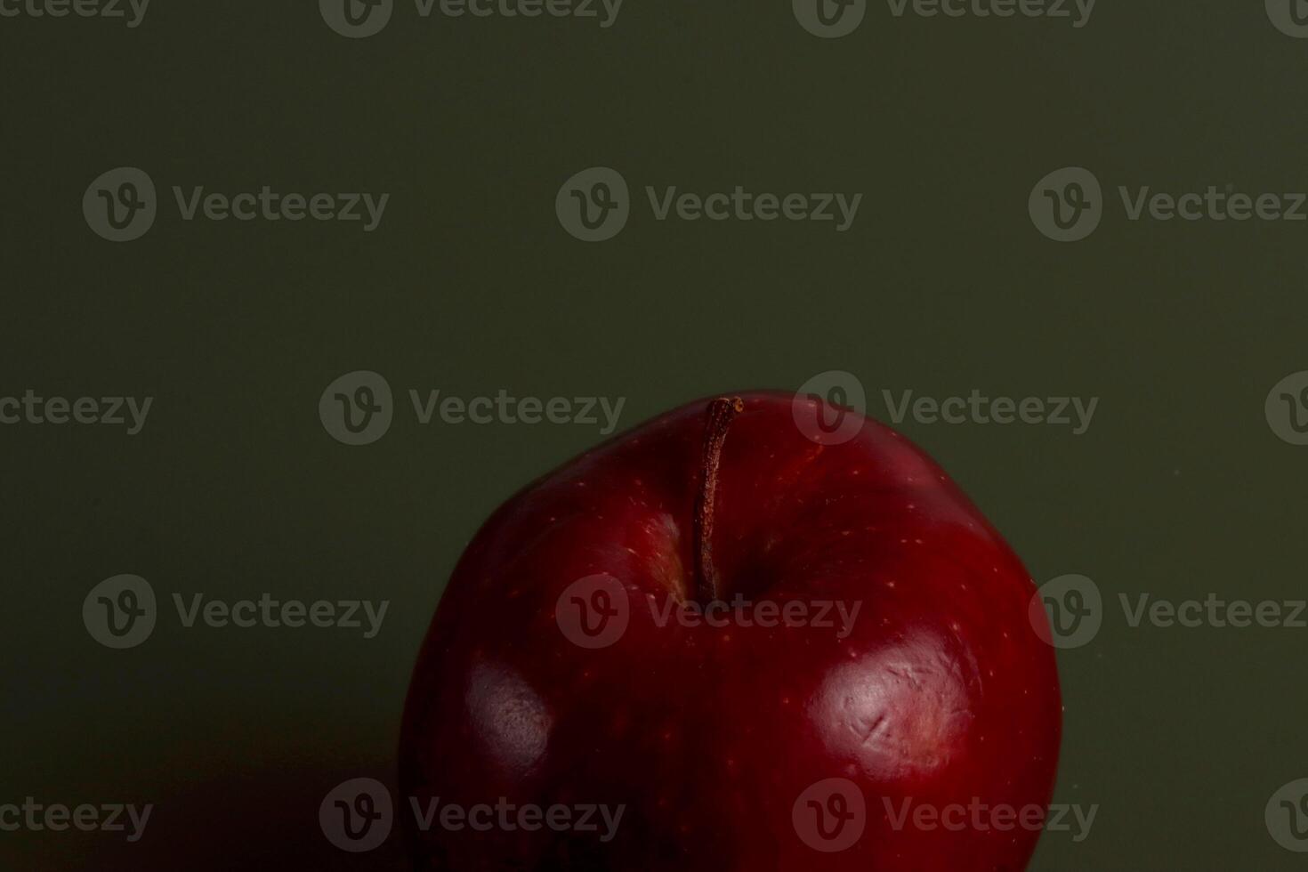 a red apple on a table eid asian photo